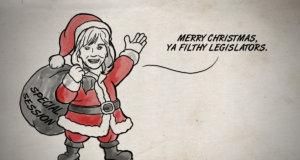 Playing Santa, Mary Fallin hands out lumps of coal Mary Fallin lumps of coal
