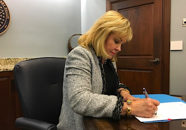 Fallin signs hotel-motel tax repeal