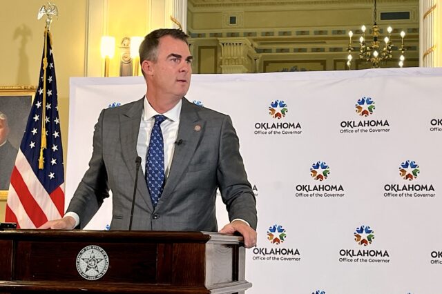 Stitt lets budget bills become law without his signature